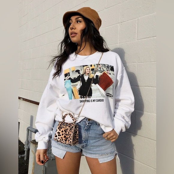 Clueless 
Cher “Shopping is my cardio” Graphic Sweatshirt - Picture 1 of 16